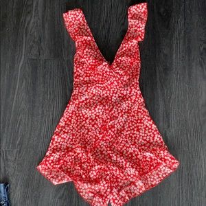 Red floral romper with tie back